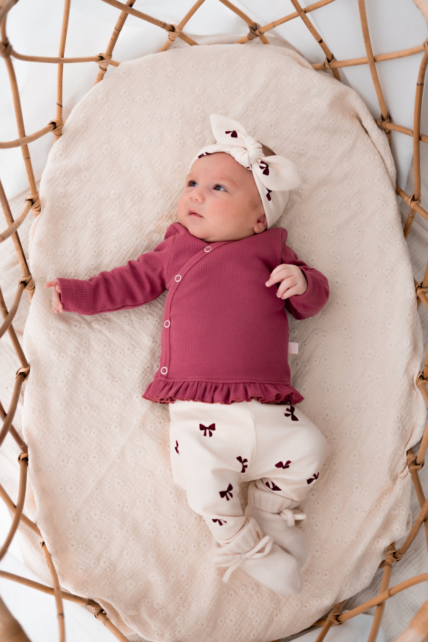 Haarbandje knoop Strikjes roze (rib)