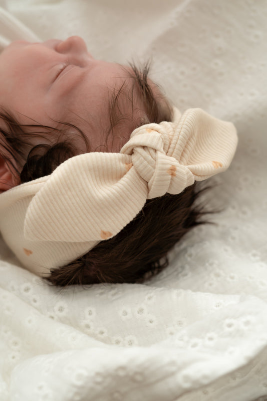 Haarbandje knoop mini hartjes Vanille (rib)