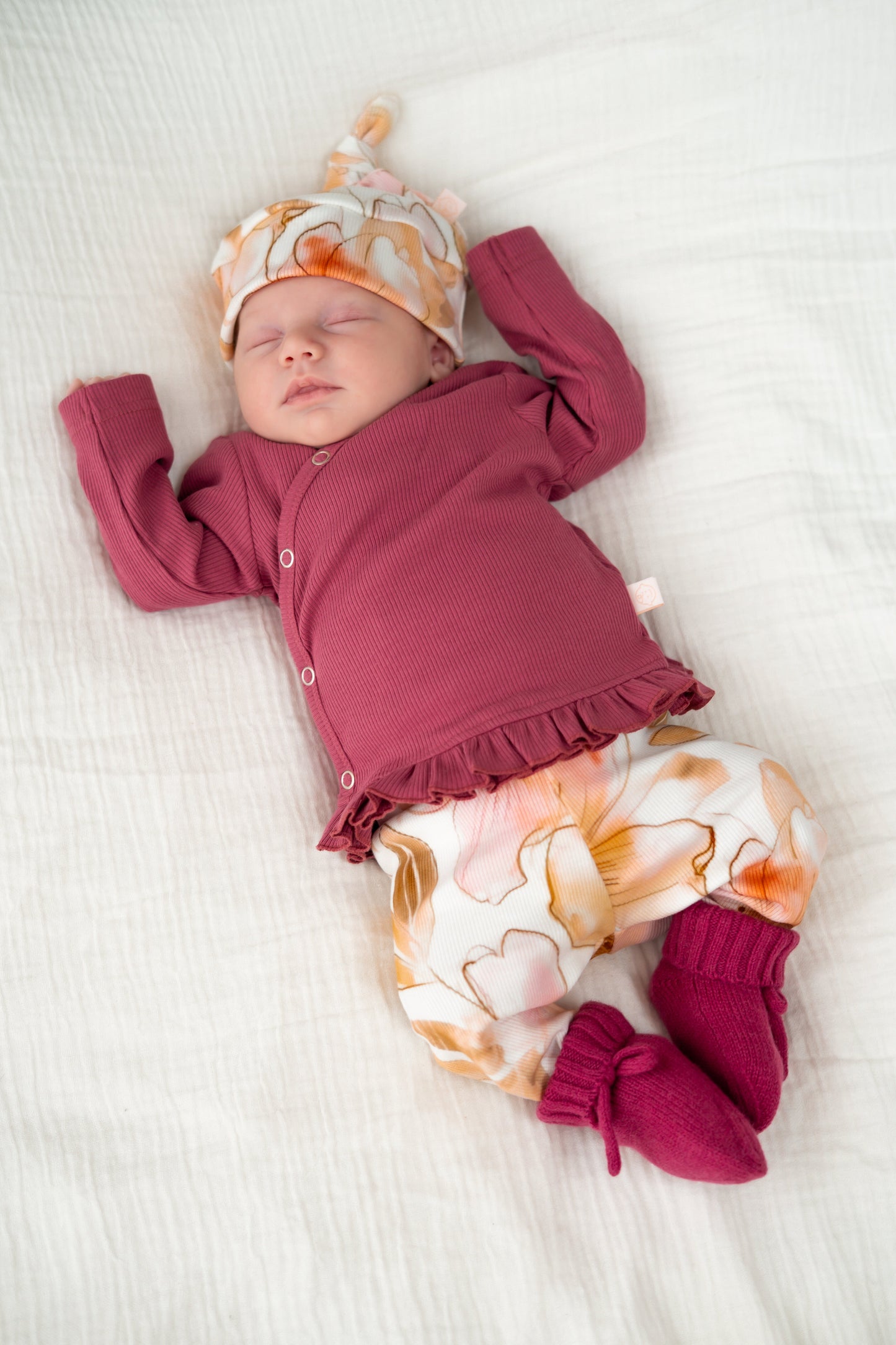 Overslagshirtje ruffle Framboos (rib)