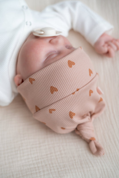 Newborn set Hartjes roze (rib) broek + muts