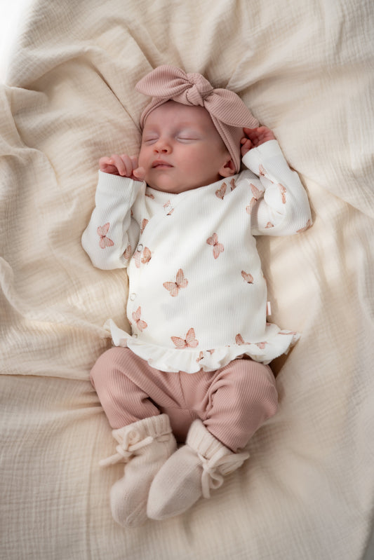 Overslagshirtje ruffle Vlinders roze (rib)